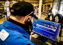 1673018170804 Viptiresandservicesalesmanlookingatscreencounterresized 1673018170804 Viptiresandservicesalesmanlookingatscreencounterresized