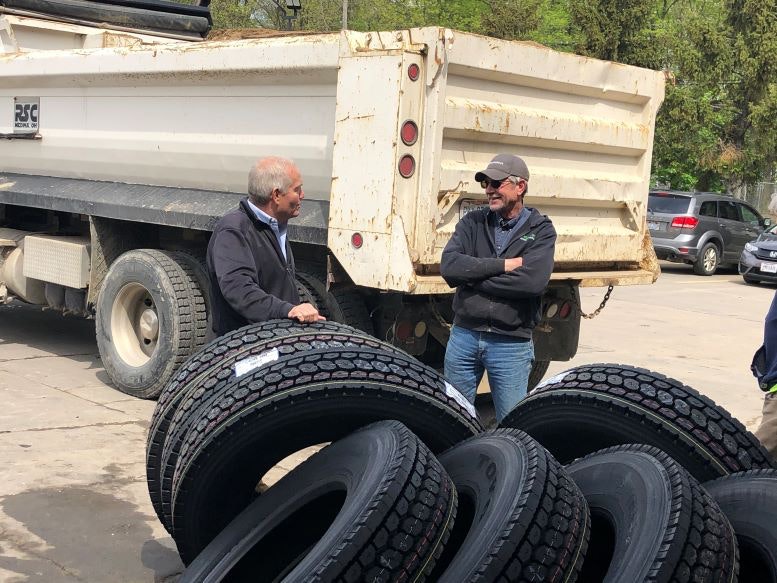 Exit_11_Tire_Jim_Smith_with_customer1-resized