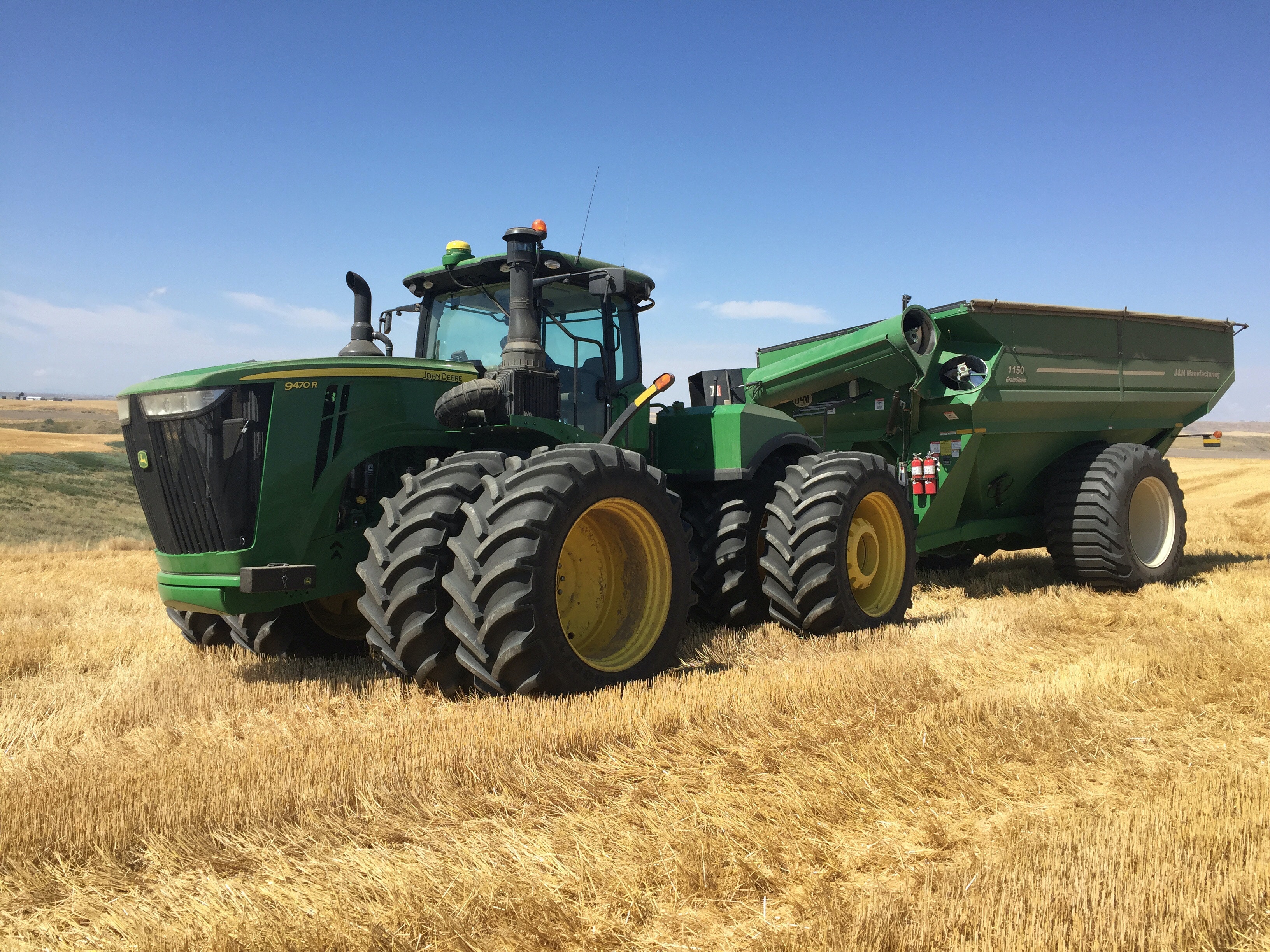 1673020416630 Titan Green Deere Tractor And Wagon Inwheat Field