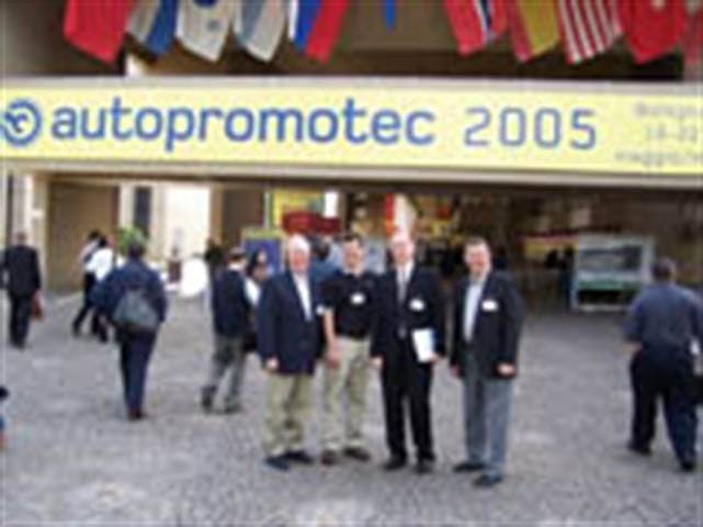 first-person-plural-publisher-greg-smith-and-a-group-of-u-s-tire-dealers-explored-autopromotec-2005-in-bologna-italy