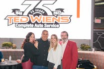 Ted Wiens Tire &amp; Auto was founded by the late Ted Wiens Sr. in 1948. Pictured are the second, third and fourth generation of Wiens family members who now run the dealership. (From left to right, Jennifer Wiens, the company&apos;s brand manager; her husband, Vice President Ted Wiens III; President Ted Wiens Jr.; and Brianna Wiens, the dealership&apos;s development manager.)