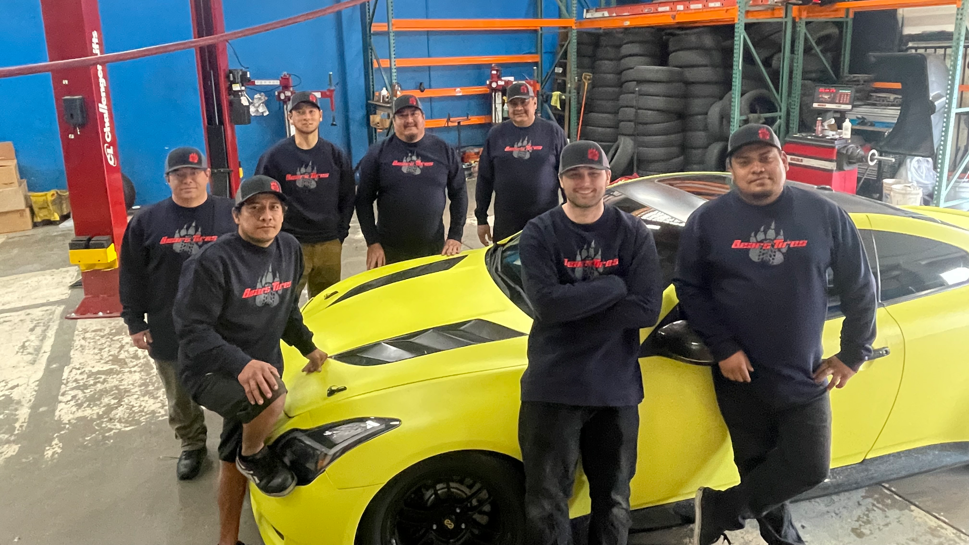 Members of the Bear's Tires team gather for a group photo. The tire dealership's team consists of 10 employees, the largest its ever been since Mike Power has owned the business.