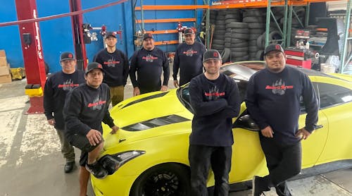 Members of the Bear&apos;s Tires team gather for a group photo. The tire dealership&apos;s team consists of 10 employees, the largest its ever been since Mike Power has owned the business.