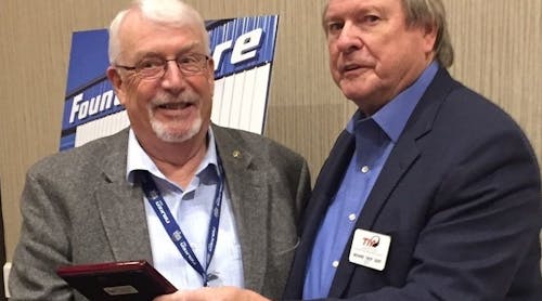 Dick Nordness (left), longtime executive director of the Northwest Tire Dealers Association, received a lifetime achievement award from the Tire Industry Association, presented by TIA CEO Dick Gust.