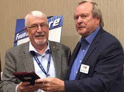 Dick Nordness (left), longtime executive director of the Northwest Tire Dealers Association, received a lifetime achievement award from the Tire Industry Association, presented by TIA CEO Dick Gust. Dick Nordness (left), longtime executive director of the Northwest Tire Dealers Association, received a lifetime achievement award from the Tire Industry Association, presented by TIA CEO Dick Gust.