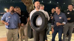 Sean Plumstead takes his turn in a round of 'tire bowling' during the 20th anniversary celebration for Tire Distributors of Georgia. Sean Plumstead takes his turn in a round of 'tire bowling' during the 20th anniversary celebration for Tire Distributors of Georgia.