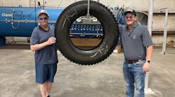 Bill Morgan Tire Co. opened a ContiLifeCycle retread shop in Lexington, Ky. Bill Morgan III, right, owns the business, and followed his father, Bill Morgan Jr., left, into the tire industry. They posed with the plant&rsquo;s first retreaded truck tire.