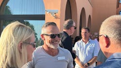 Darren Thomas, SRNA’s president and CEO (center, talking with Don Majors from Discount Tire and Marilyn Majors), attributes the Falken Fanatic associate dealer program’s remarkable growth to SRNA “taking the initiative to put 30 well-trained individuals on the street who are going to make 10 sales calls per day. Thirty times 10 is 300 and you’re going to sign some percentage of those.' Darren Thomas, SRNA’s president and CEO (center, talking with Don Majors from Discount Tire and Marilyn Majors), attributes the Falken Fanatic associate dealer program’s remarkable growth to SRNA “taking the initiative to put 30 well-trained individuals on the street who are going to make 10 sales calls per day. Thirty times 10 is 300 and you’re going to sign some percentage of those.'