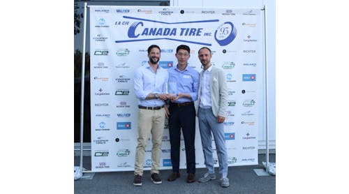 Stephen Park, president of Nexen Tire Canada, hands Canada Tire CEO Gabriel Granatstein (left) and Chris Moody, Canada Tire&apos;s director of sales, a celebratory award.