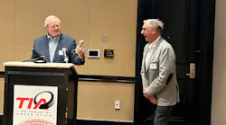 Dick Gust presents Jim Pangle with a customized bobblehead with thanks for his work as TIA board president over the last year. TIA board members in attendance noticed Pangle even wore an outfit that matched that of the bobblehead.