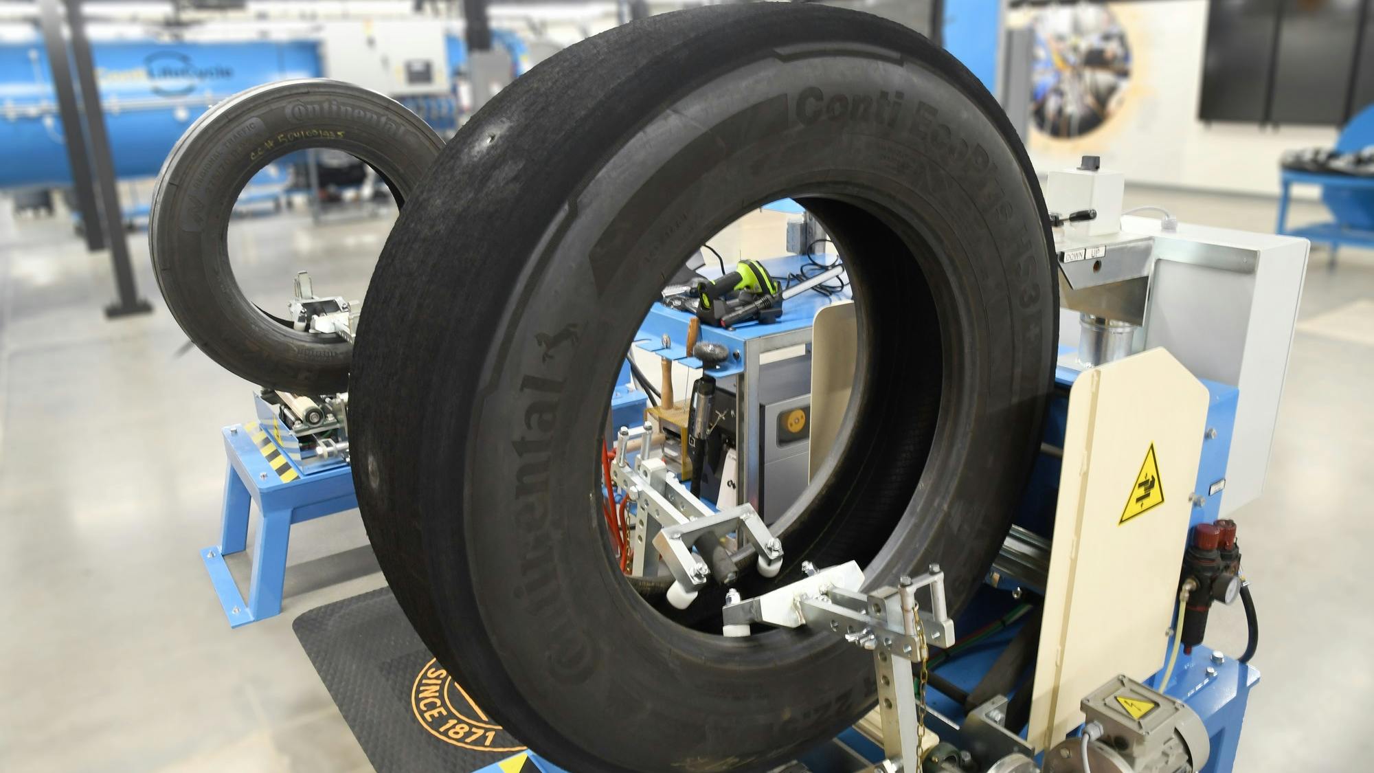 The Continental Retread Solutions Development Center will focus on both improvements to the retread process, as well as the development of technology. Here, a tire awaits service in the repair station.