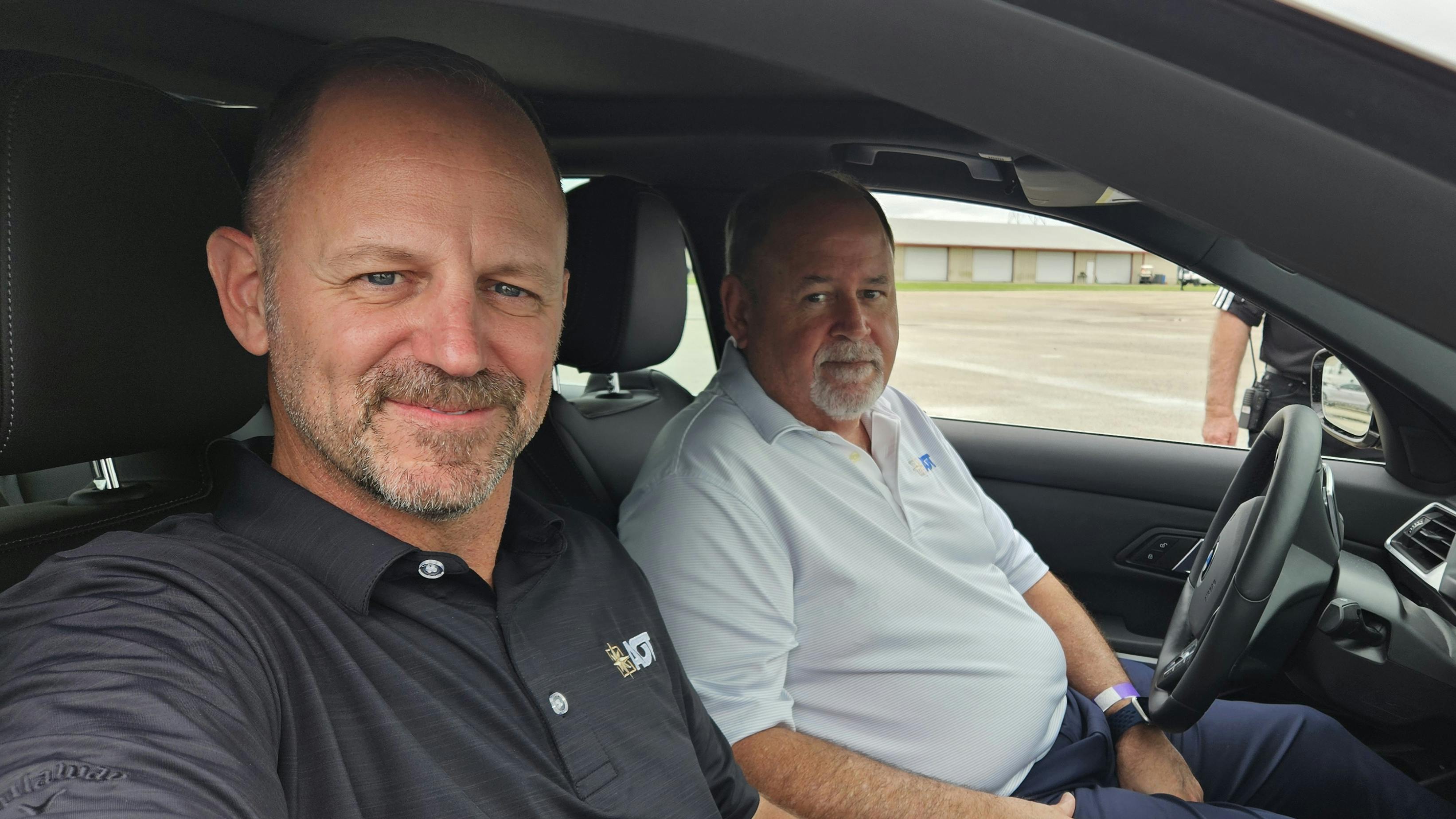'We believe in relationships and having a high level of transparency and honesty,' says Tom Brackin, CEO of American Omni Trading Co. (AOT), pictured in the driver's seat next to AOT President Chris Brackin.