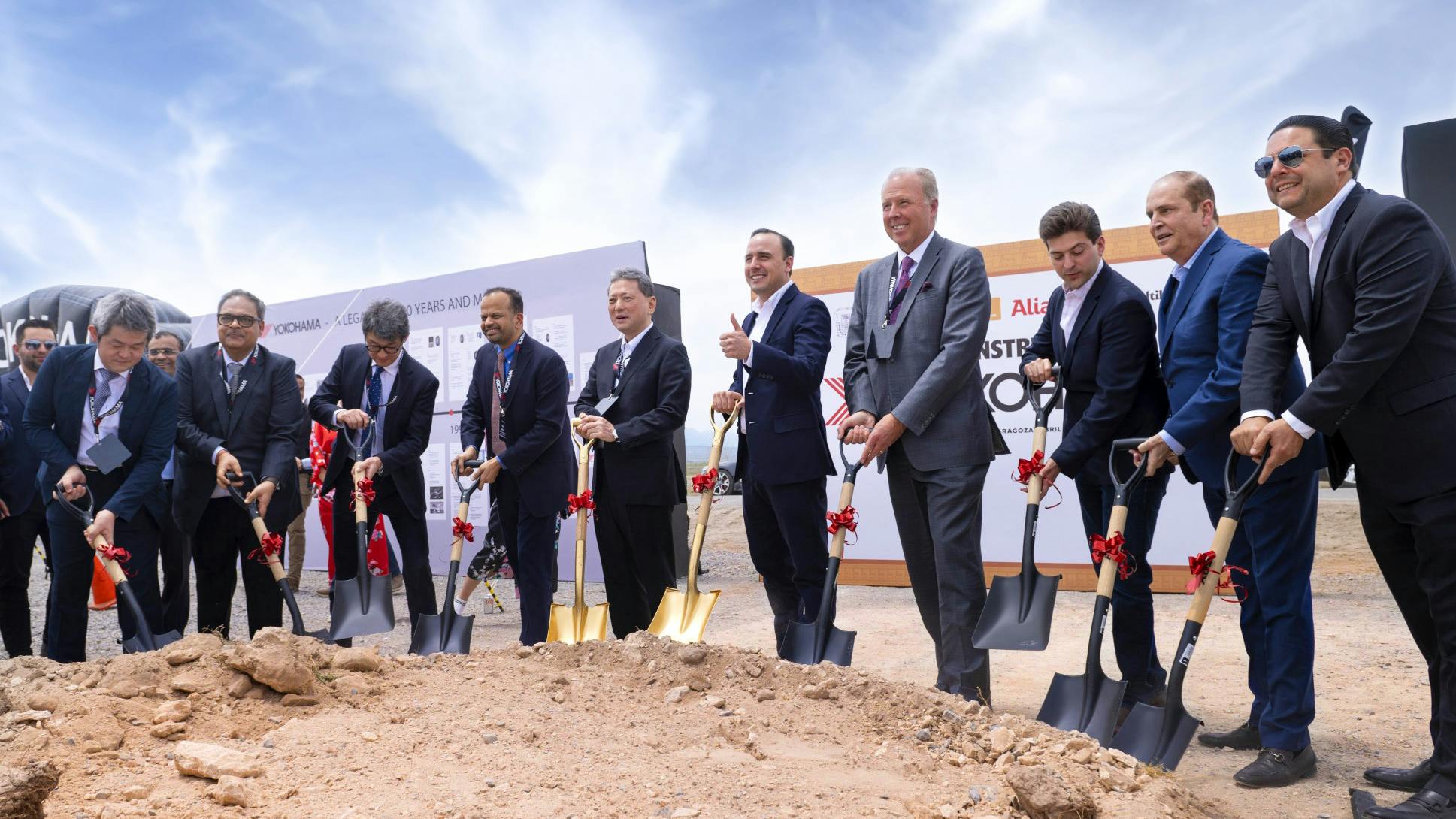 &ldquo;We stand here today in celebration and recognize the best employees and best customers in the world,&rdquo; says Yokohama Tire Corp. CEO Jeff Barna (pictured, fourth from right.)