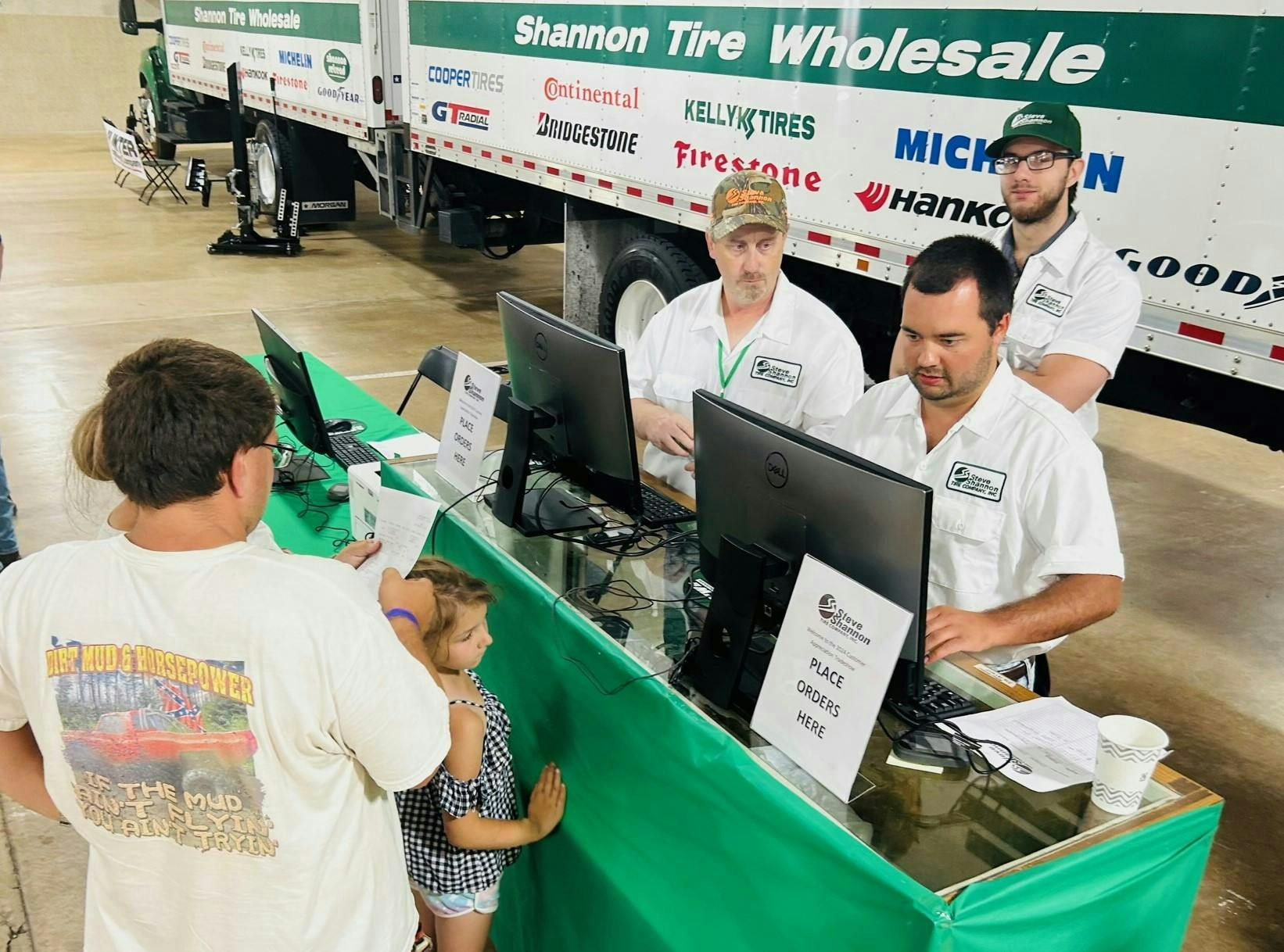 Inside the trade show hall, Steve Shannon Tire representatives, including Steven Shannon, one of the dealership’s owners, (pictured on the right, behind table), processed orders placed by customers of the company's Shannon Tire Wholesale division.