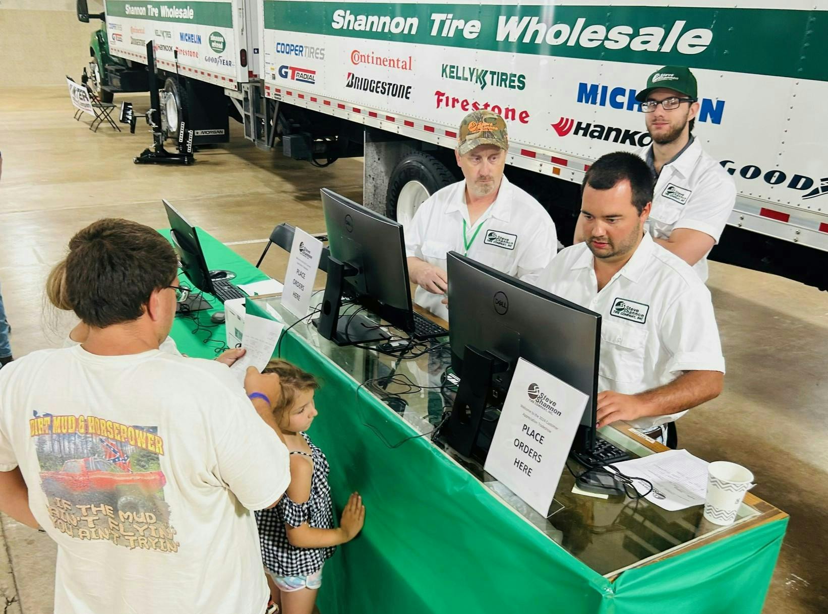 Inside the trade show hall, Steve Shannon Tire representatives, including Steven Shannon, one of the dealership’s owners, (pictured on the right, behind table), processed orders placed by customers of the company's Shannon Tire Wholesale division. Inside the trade show hall, Steve Shannon Tire representatives, including Steven Shannon, one of the dealership’s owners, (pictured on the right, behind table), processed orders placed by customers of the company's Shannon Tire Wholesale division.