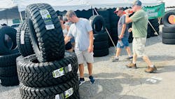 On the Bloomsburg (Pa.) Fairgrounds midway, Steve Shannon Tire employees, operating out of a large tent, sold tires to attendees. The dealership brought 600 units to the three-day event. On the Bloomsburg (Pa.) Fairgrounds midway, Steve Shannon Tire employees, operating out of a large tent, sold tires to attendees. The dealership brought 600 units to the three-day event.