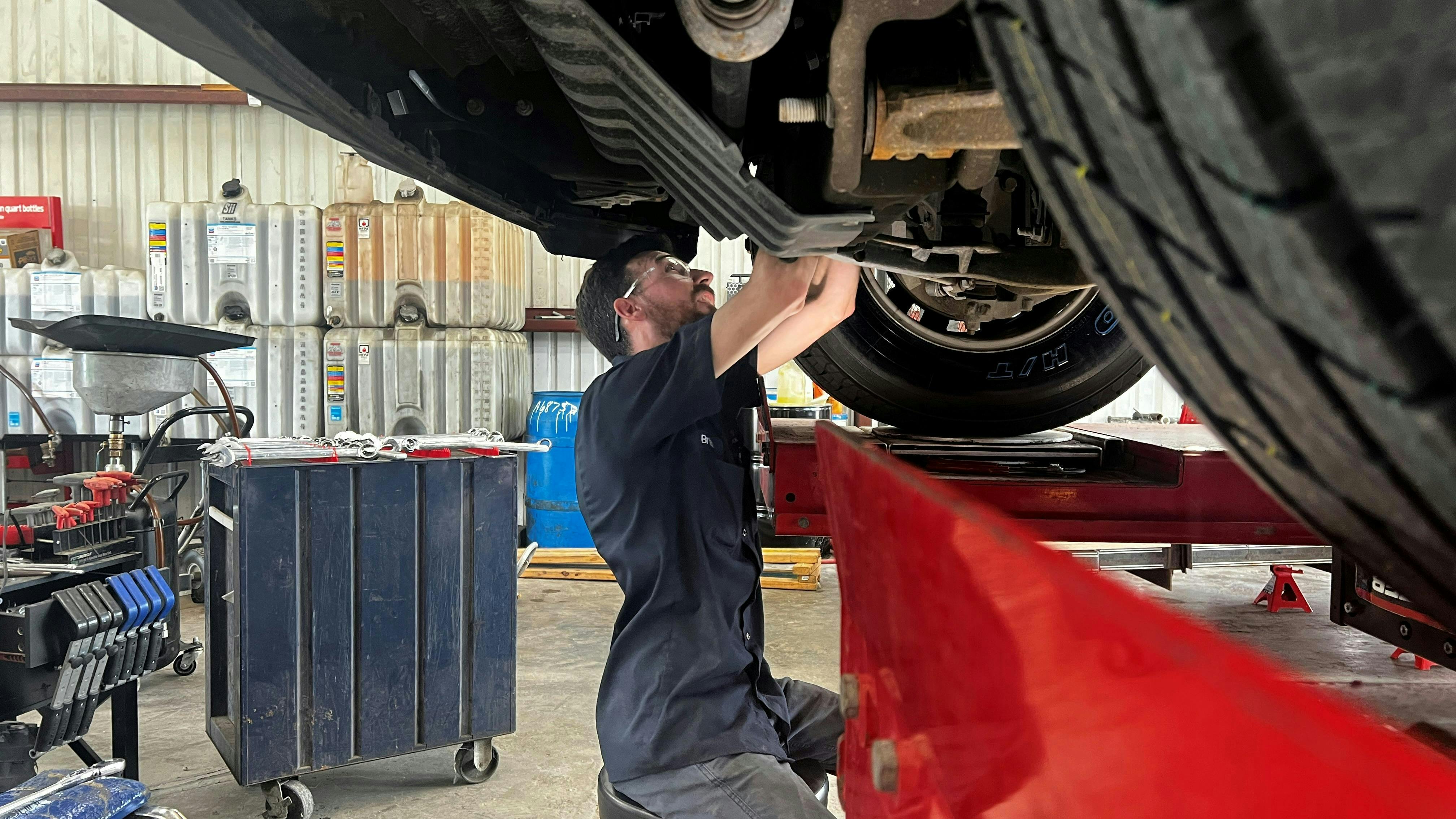 Brian Garrows performs an alignment on a GMC Sierra 2500 HD pickup. Trucks and SUVs dominate the car parc in Chabill's Tire & Auto Service's territory.