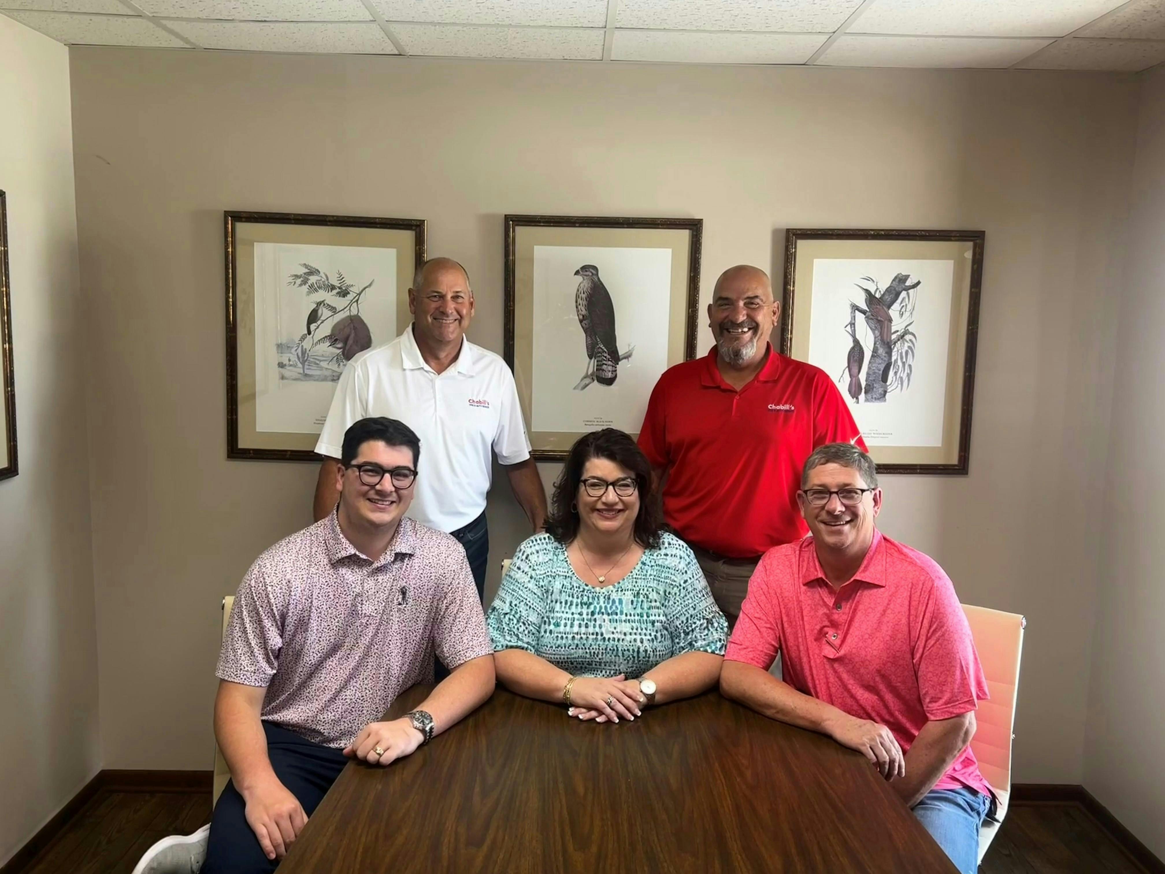 Beth Barron leans on her executive team to lead and grow Chabill's Tire & Auto Service. Front row from the left is her son, Charlie Barron, Barron, and her husband Carey Barron. Back row from left is Eric Roundtree and Martin Michel. Beth Barron leans on her executive team to lead and grow Chabill's Tire & Auto Service. Front row from the left is her son, Charlie Barron, Barron, and her husband Carey Barron. Back row from left is Eric Roundtree and Martin Michel.