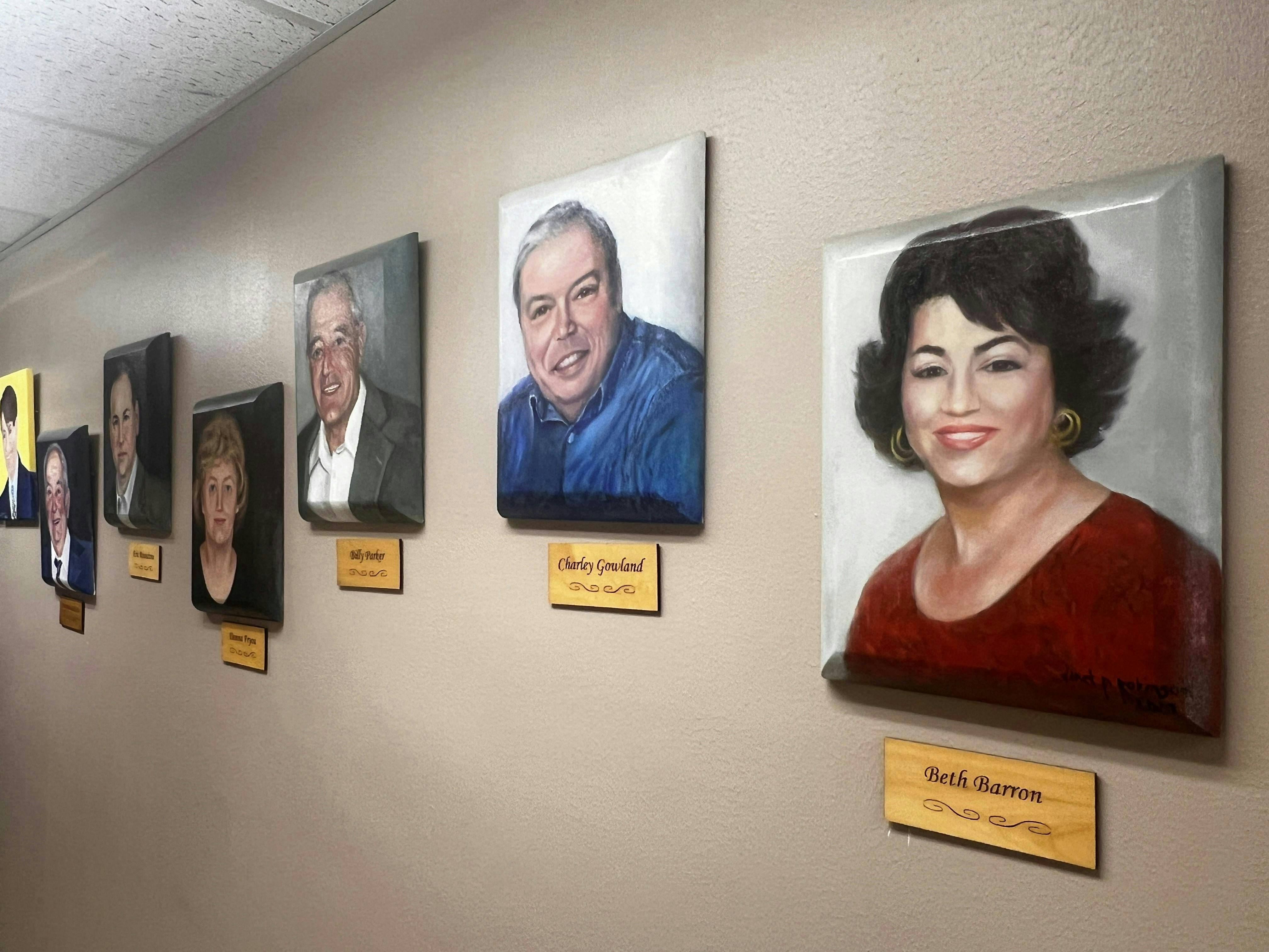 Years ago employees who hit the 10-year mark of employment at Chabill's Tire & Auto Service were recognized with a painted portrait that hangs in the corporate office hallway. Beth Barron's portrait hangs next to her father's. Years ago employees who hit the 10-year mark of employment at Chabill's Tire & Auto Service were recognized with a painted portrait that hangs in the corporate office hallway. Beth Barron's portrait hangs next to her father's.