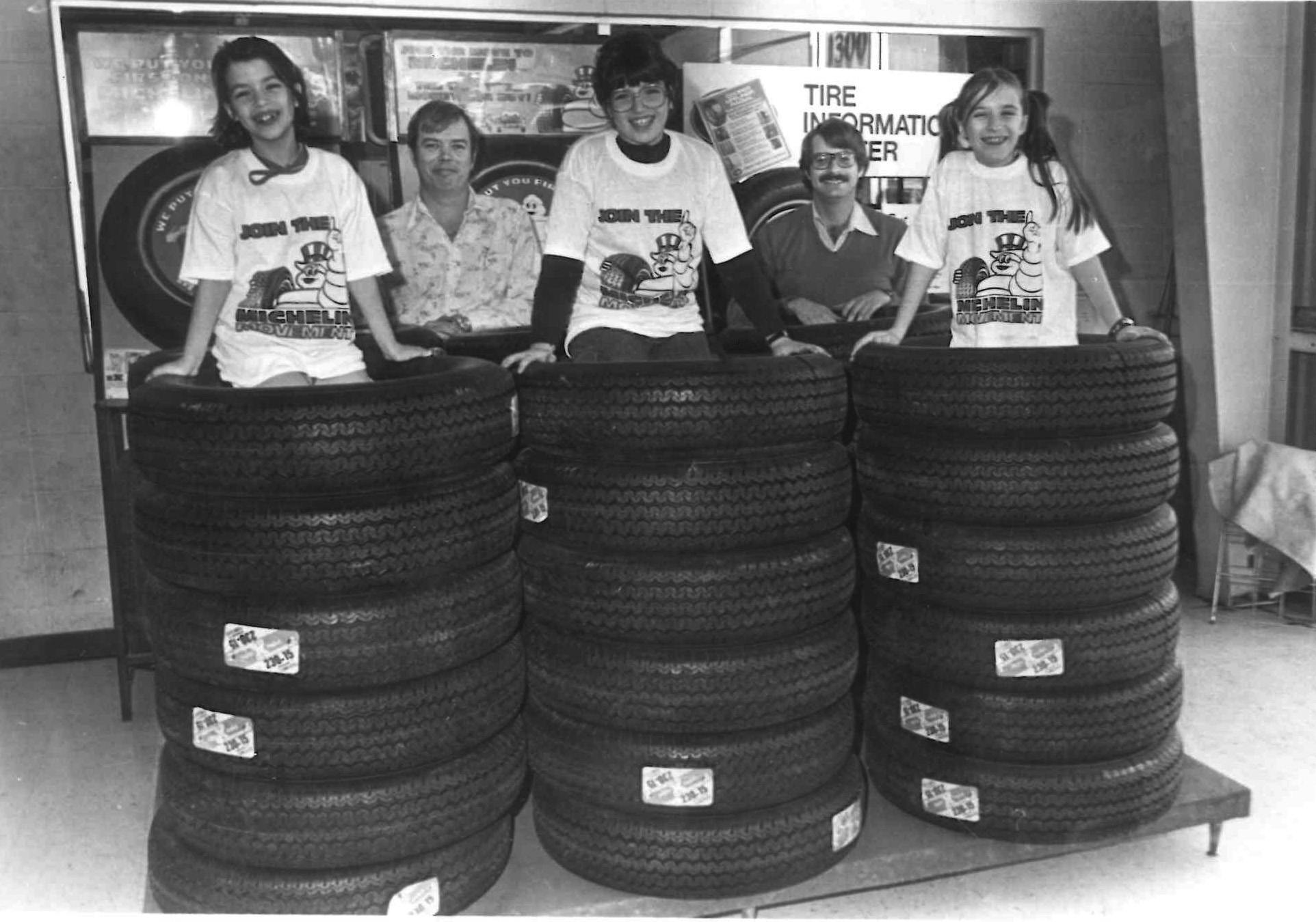 Beth Barron has grown up alongside her family's tire dealership, and that almost automatically equates to having photos of herself amid stacks of tires. Here she's pictured at the far left next to her sister Catherine and a cousin. Her father Charley Gowland is pictured in the back row between his two daughters and alongside a former Cooper Tire & Rubber Co. employee. Beth Barron has grown up alongside her family's tire dealership, and that almost automatically equates to having photos of herself amid stacks of tires. Here she's pictured at the far left next to her sister Catherine and a cousin. Her father Charley Gowland is pictured in the back row between his two daughters and alongside a former Cooper Tire & Rubber Co. employee.
