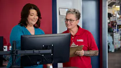 Beth Barron is the third woman honored as a Tire Dealer of the Year — two other women were named alongside their husbands. Barron is the first sole female tire dealership executive to win the award. She's pictured here with manager Heather Guarisco, who leads the company's three-time store of the year.