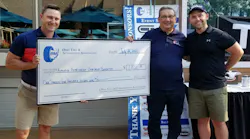 Chuck McCourt (second from right) has retired from the Automotive Aftermarket Charitable Foundation.