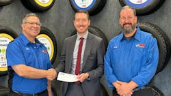 Richard DiBeneditto (left), manager at VIP Tires & Service’s Waterbury, Conn., location, and Greg Bagley (right), VIP Tires’ special projects manager, present a check to Dr. Darren Schwartz, interim superintendent at Waterbury (Conn.) Public Schools. Richard DiBeneditto (left), manager at VIP Tires & Service’s Waterbury, Conn., location, and Greg Bagley (right), VIP Tires’ special projects manager, present a check to Dr. Darren Schwartz, interim superintendent at Waterbury (Conn.) Public Schools.
