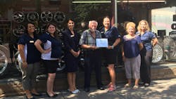 Ted Mahone (center), owner of Mahone Tire in Marietta, Ohio, credits the longevity to a service-oriented approach and involvement in his community. Ted Mahone (center), owner of Mahone Tire in Marietta, Ohio, credits the longevity to a service-oriented approach and involvement in his community.