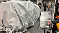 With the Vehicle Fire Blanket on display, some might have mistaken the front of the JohnDow booth as the site of a vehicle giveaway. But the blanket is part of a larger lineup of EV and hybrid safety equipment. With the Vehicle Fire Blanket on display, some might have mistaken the front of the JohnDow booth as the site of a vehicle giveaway. But the blanket is part of a larger lineup of EV and hybrid safety equipment.