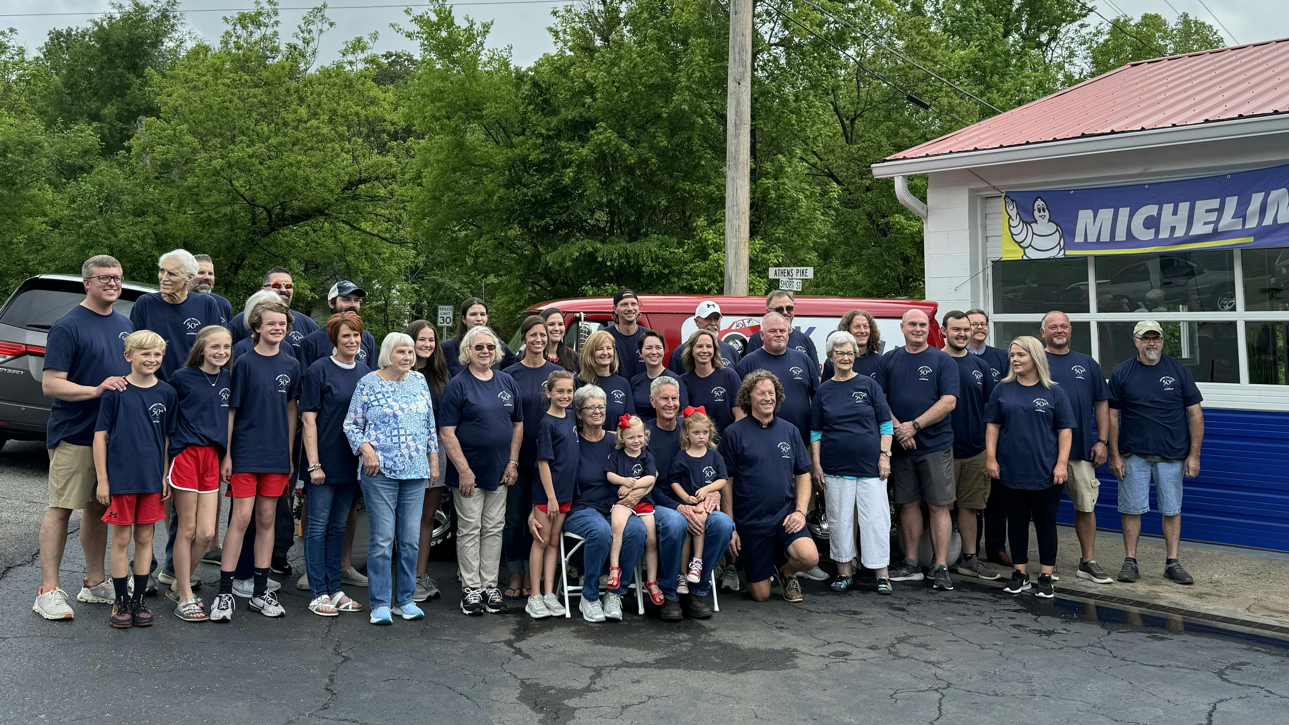 At each anniversary celebration, Bookout invites current and past Bookout Tire and Lube employees to celebrate in the fun. Pictured are current and past employees, plus family members filling in for those who have passed.