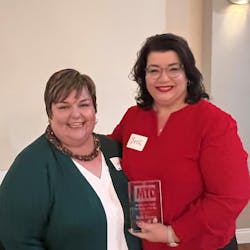 MTD Managing Editor Joy Kopcha, left, presented Beth Barron with a trophy for being named the 2024 Tire Dealer of the Year. Barron celebrated the win with her Chabill's Tire & Auto Service team during the company's Christmas party. MTD Managing Editor Joy Kopcha, left, presented Beth Barron with a trophy for being named the 2024 Tire Dealer of the Year. Barron celebrated the win with her Chabill's Tire & Auto Service team during the company's Christmas party.