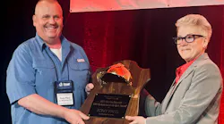 TIA President Debra Hamlin presented the Marvin Bozarth ETS Technician of the Year Award to Tony Pass of Jim Whitehead’s Best-One Tire & Service in Oakwood, Ga. “I feel like I’m in a dream,” said Pass upon receiving the honor in front of 500 OTR Tire Conference attendees.