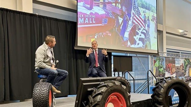 Mike Naig (right), secretary of agriculture for Iowa, and Scott Sloan, global ag/LSW product manager at Titan, shared the stage at the 2025 Titan University Summit.