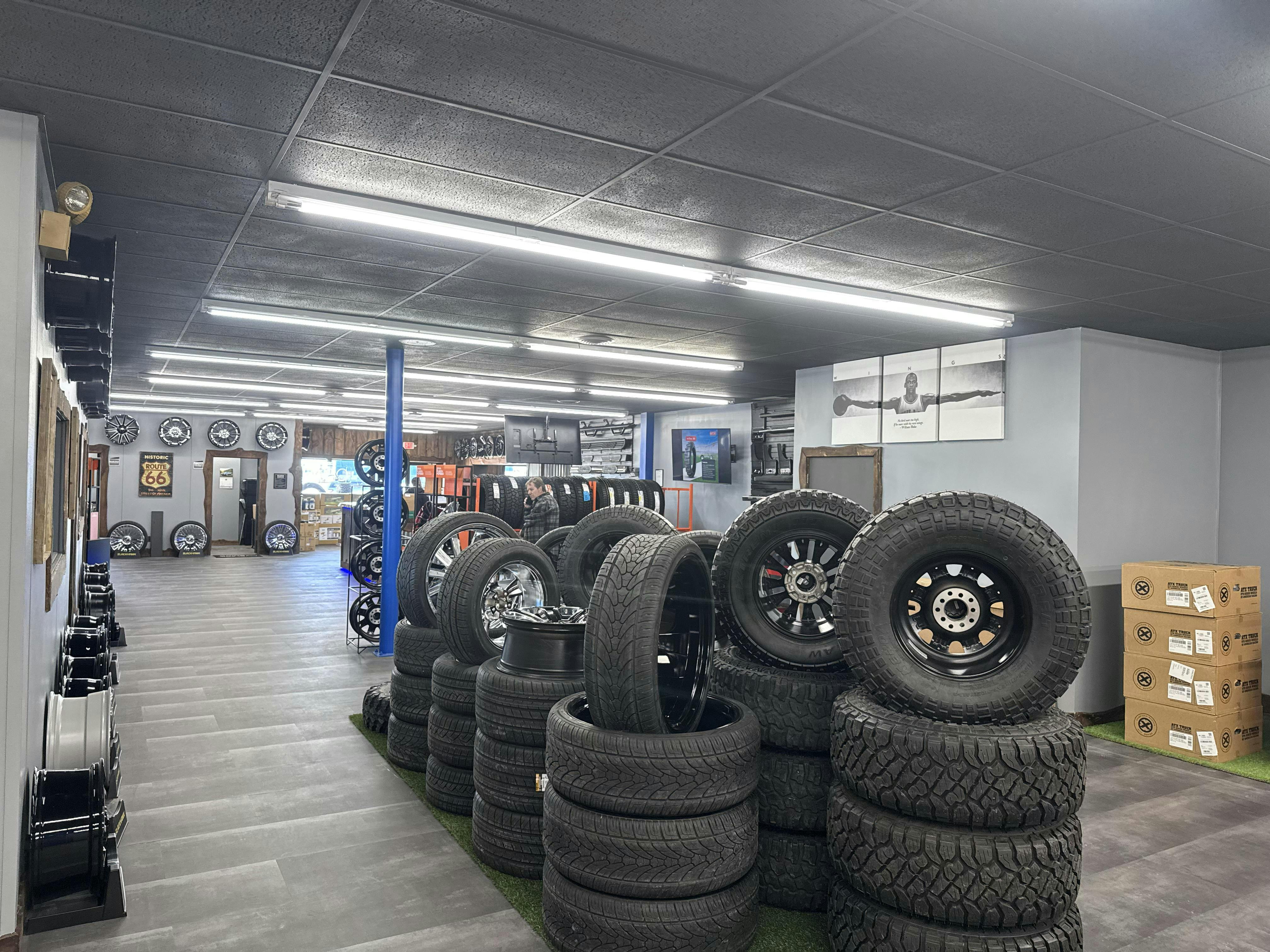 Adam Miller says he typically keeps 150 sets of wheels in stock in his Grand Island, Neb., store, and that black and machined designs have replaced the busy chrome styles of the previous decade. Adam Miller says he typically keeps 150 sets of wheels in stock in his Grand Island, Neb., store, and that black and machined designs have replaced the busy chrome styles of the previous decade.