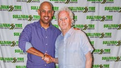 Alex Cora, manager of the Boston Red Sox (left), shakes hands with Paul Sullivan, vice president of marketing for Norwell, Mass.-based Sullivan Tire Co. Inc. Alex Cora, manager of the Boston Red Sox (left), shakes hands with Paul Sullivan, vice president of marketing for Norwell, Mass.-based Sullivan Tire Co. Inc.