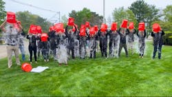 Led by Paul Sullivan, vice president of marketing for Sullivan Tire, the employees dumped cold water on themselves in support of those affected by ALS. Led by Paul Sullivan, vice president of marketing for Sullivan Tire, the employees dumped cold water on themselves in support of those affected by ALS.