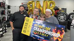RNR Tire Express recently honored Ryan Loetscher (second from left) as part of its annual Father's Day Giveaway promotion.