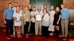 Generations of the Benton family gathered to celebrate Ricky Benton, president of Black's Tire Service Inc., receiving the Order of the Long Leaf Pine. Generations of the Benton family gathered to celebrate Ricky Benton, president of Black's Tire Service Inc., receiving the Order of the Long Leaf Pine.