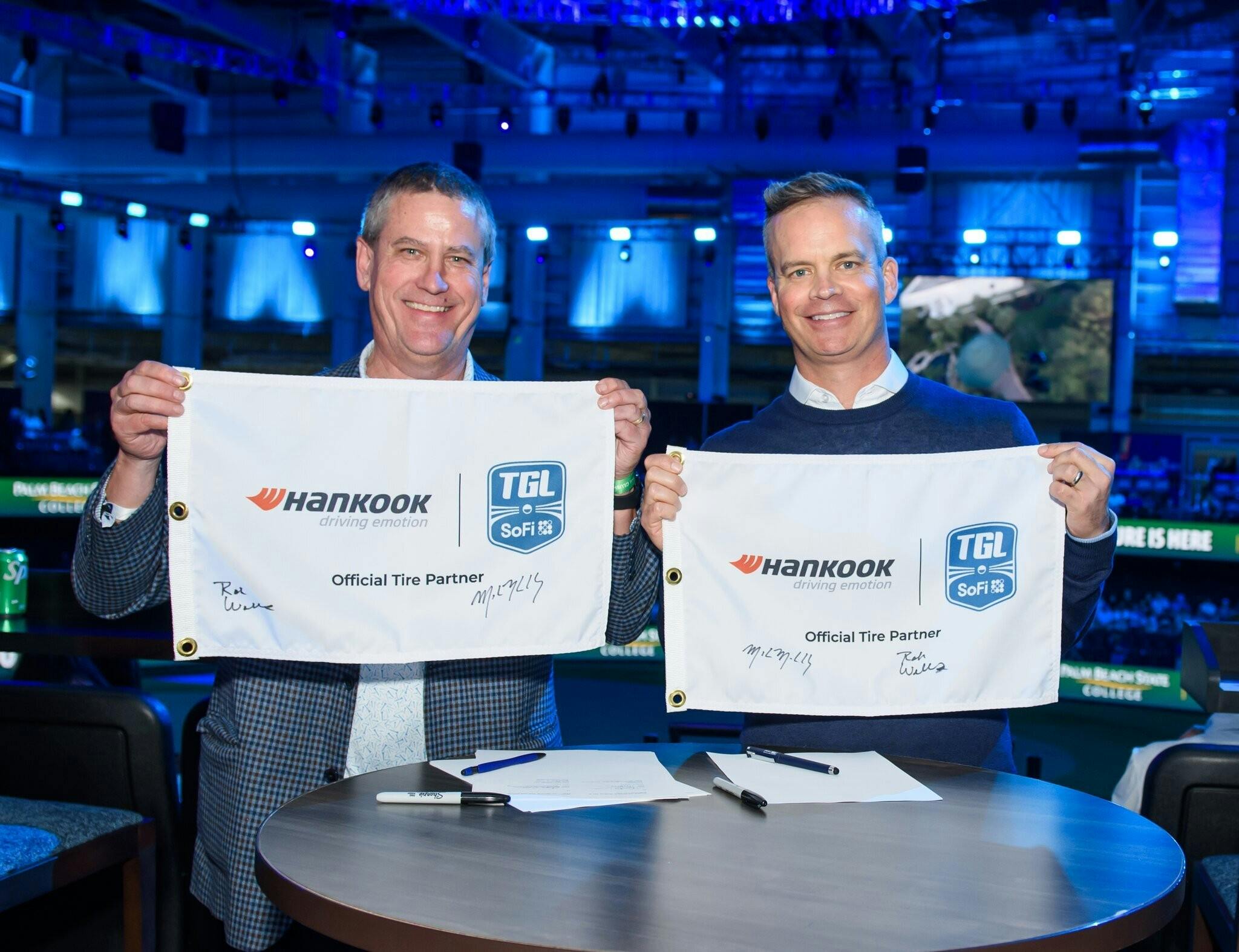 Mike McCarley, co-founder of TGL, and Rob Williams, CEO of Hankook Tire North America, show off their multi-year partnership at the opening of TGL Season 2.