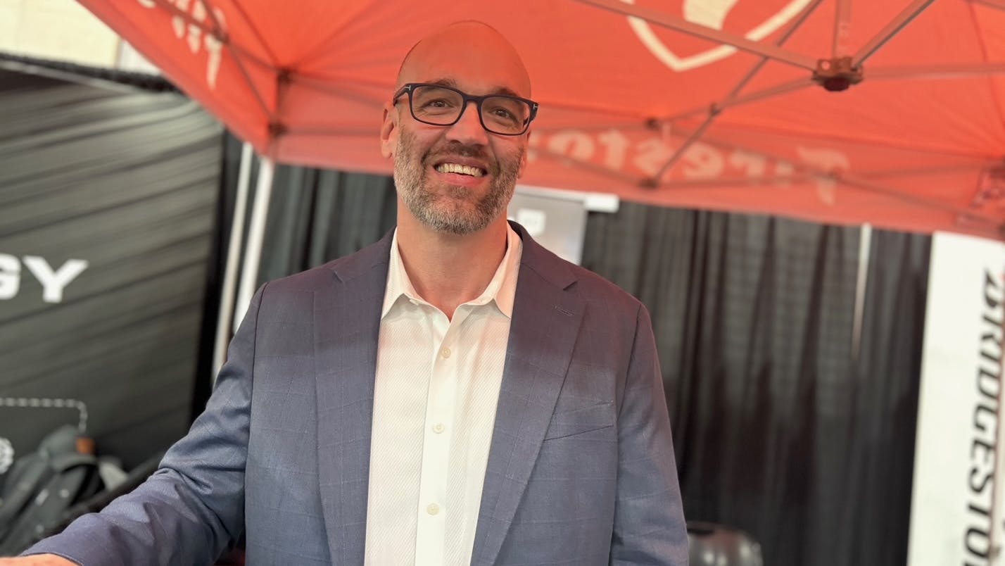 'At the end of the day, we need farmers to grow food,' said Jamey Smart, vice president, North America, Firestone Ag (pictured at K&M Tire Inc.'s annual meeting in Overland Park, Kan.)