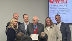 Tom Ahern Sr. (center) was recently honored with the Cassidy Tire Legacy Award. Tom Ahern Sr. (center) was recently honored with the Cassidy Tire Legacy Award.
