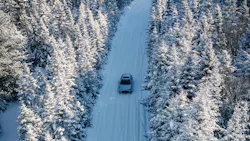 car on snowy road car on snowy road