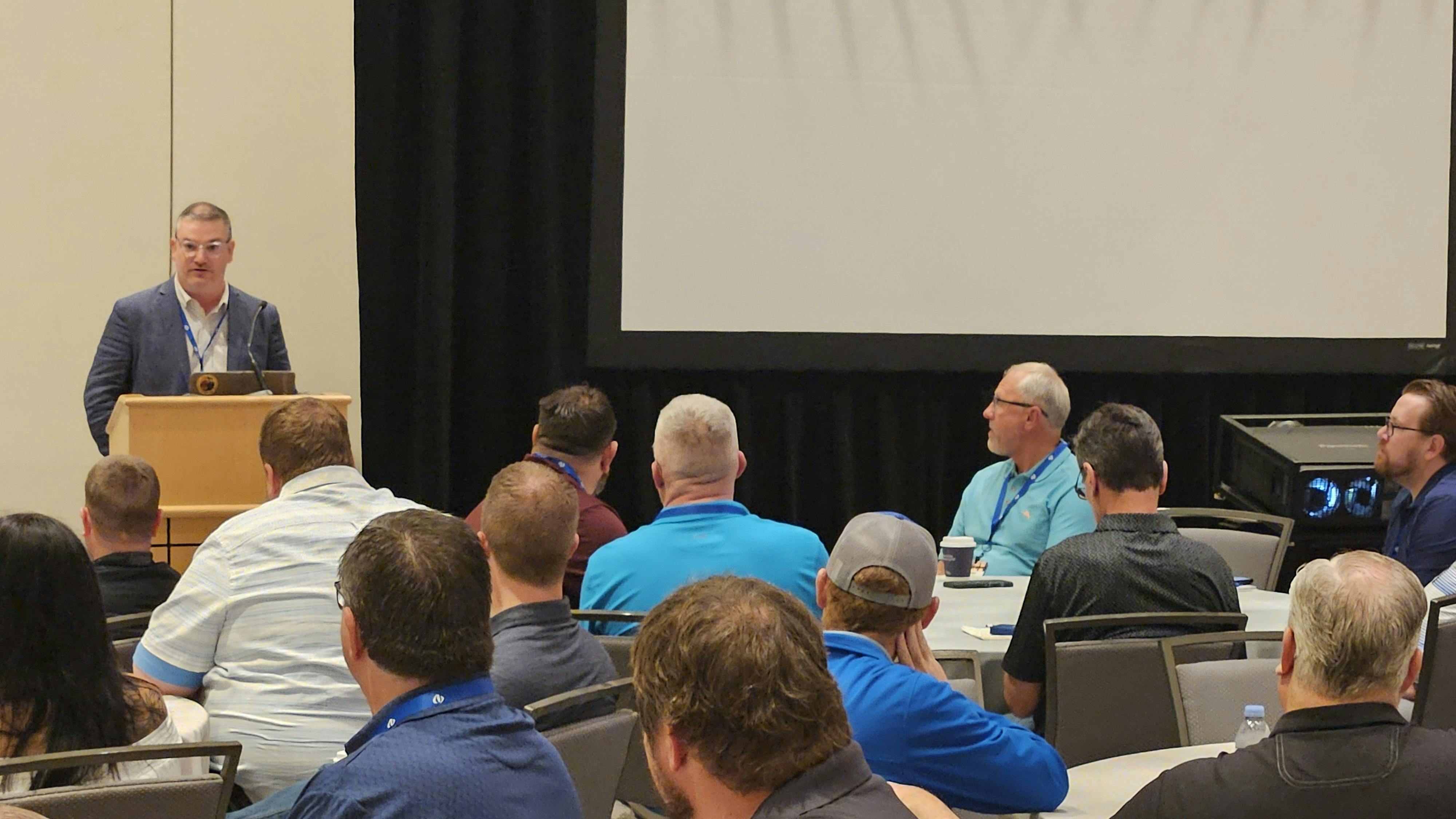 Randy O&rsquo;Connor, owner of D2D Development Group and MTD columnist (pictured at podium), moderated a tire dealer discussion at the recent Independent Tire Dealers Group LLC meeting in Orlando, Fla.