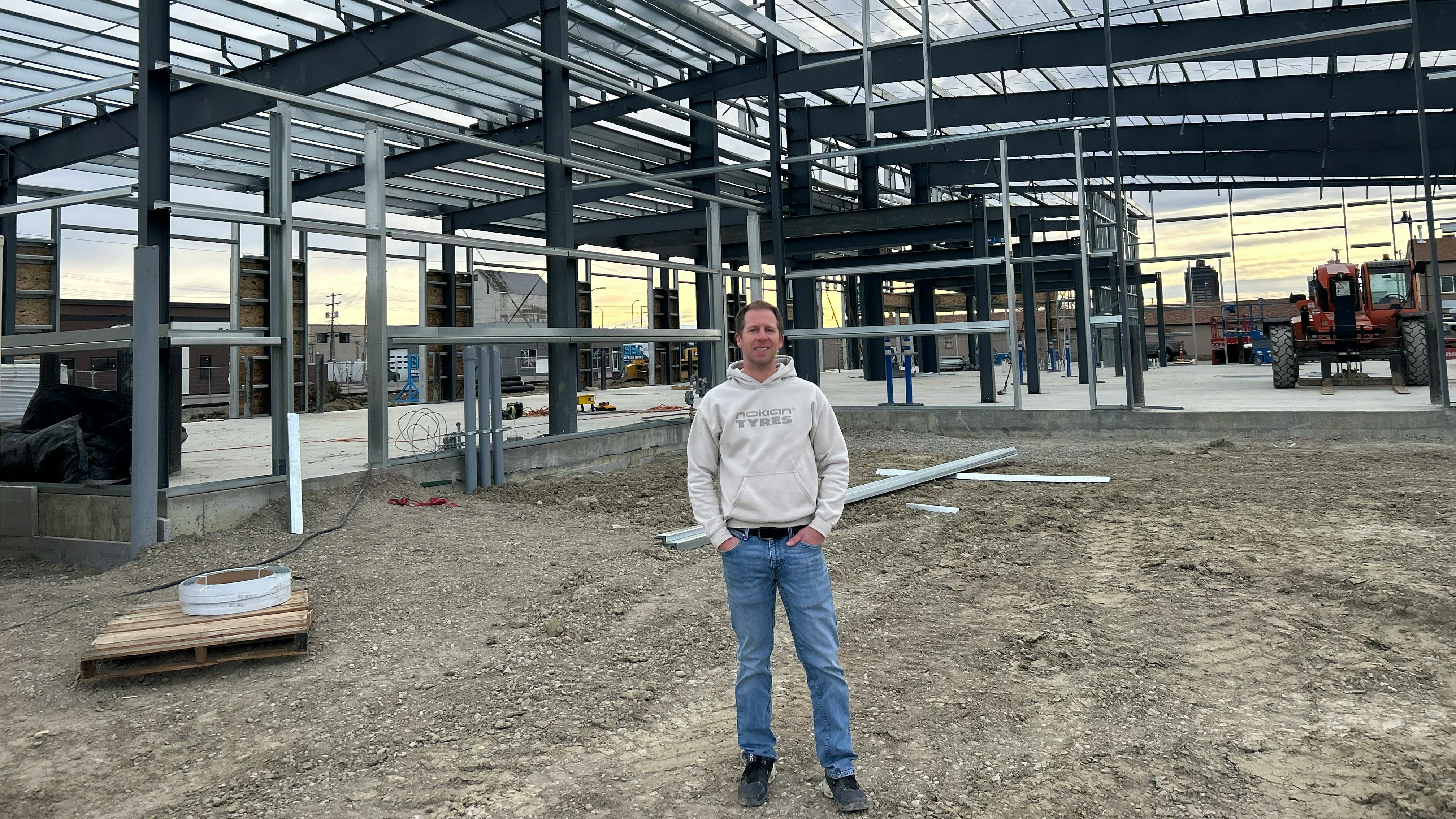 Ryan Anderson, president of Montana Tire Distributors and Montana Tire & Alignment, stands on the site of what will be Montana Tire & Alignment's new retail store, which is under construction.