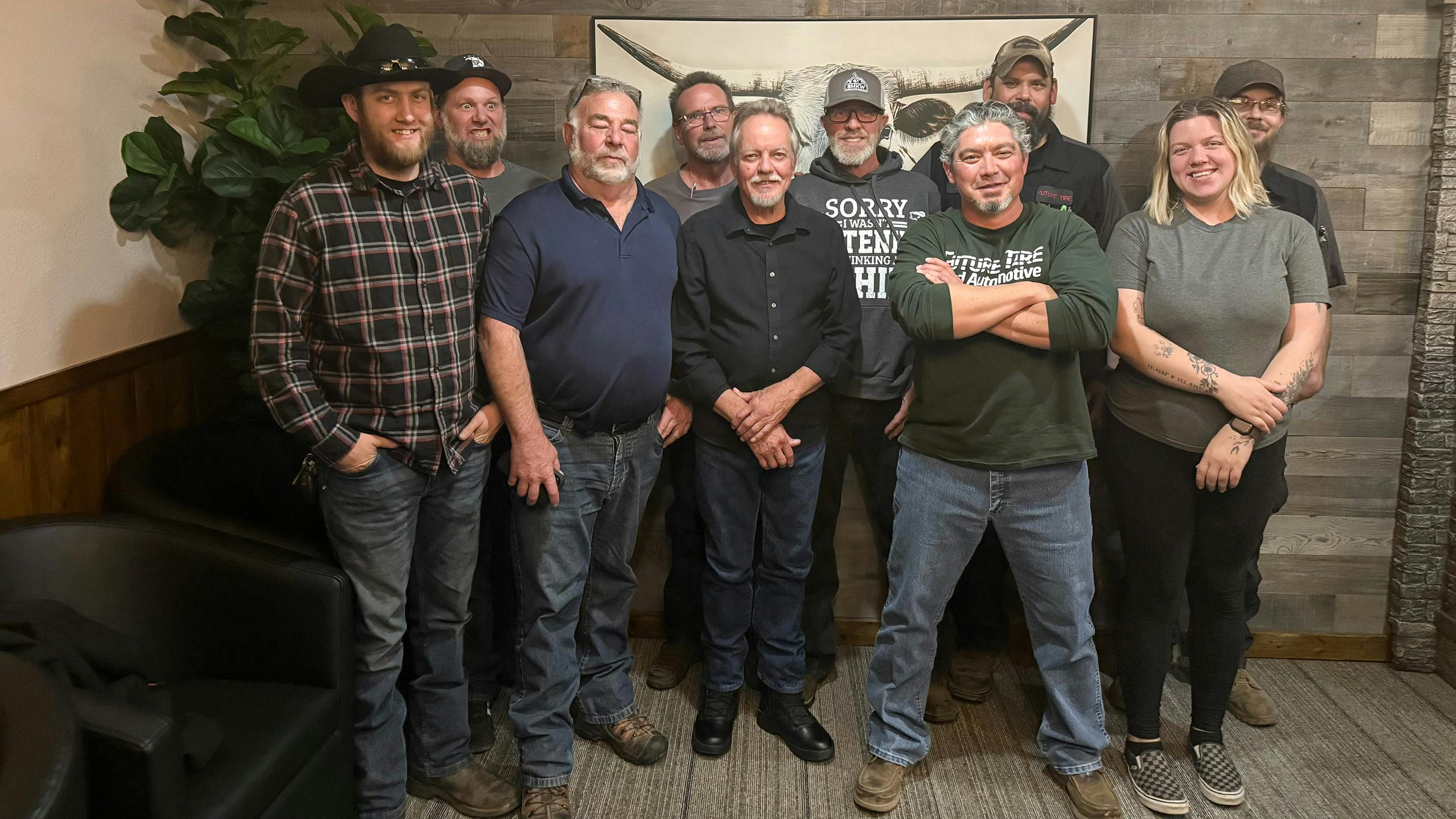 'I've formed bonds with my staff and management team that I feel are really rewarding,' says Dave Schonaerts (pictured front row, second from right), owner of Future Tire & Automotive.