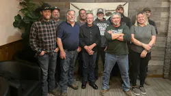 'I've formed bonds with my staff and management team that I feel are really rewarding,' says Dave Schonaerts (pictured front row, second from right), owner of Future Tire & Automotive.
