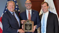 Jonathan Morrison, administrator of the National Highway Traffic Safety Administration (pictured, center), recently received the TIA Leadership Award.