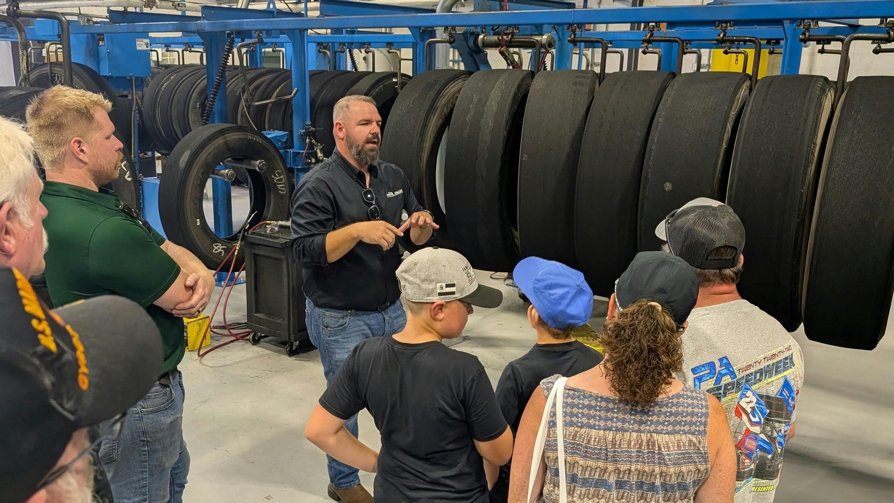 Ben Williams, field technician and Midwest regional sales manager, Pre-Q Galgo (center), discussed steps of the retreading process at Steve Shannon Tire Co.'s recent open house.