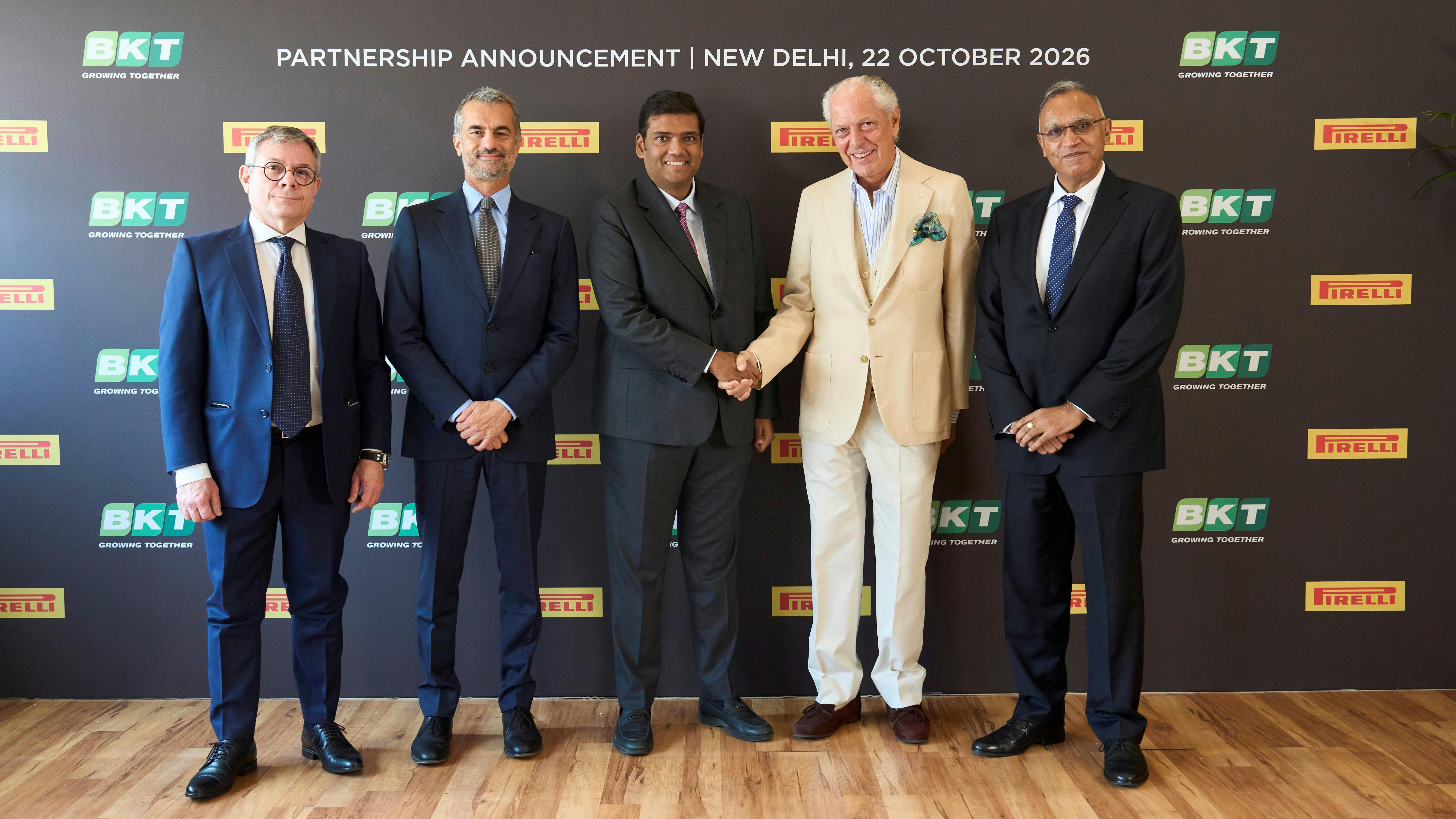 BKT will produce up to 800,000 Pirelli-brand tires by 2030 'with Pirelli's specific technological and quality standards,' according to officials from both companies. (Pictured, Pirelli and BKT executives.)